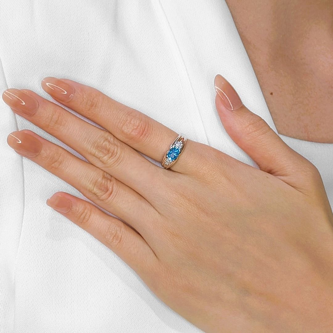 Alluring 0.96 Blue Topaz Ring with Side Diamonds in 18K White Gold