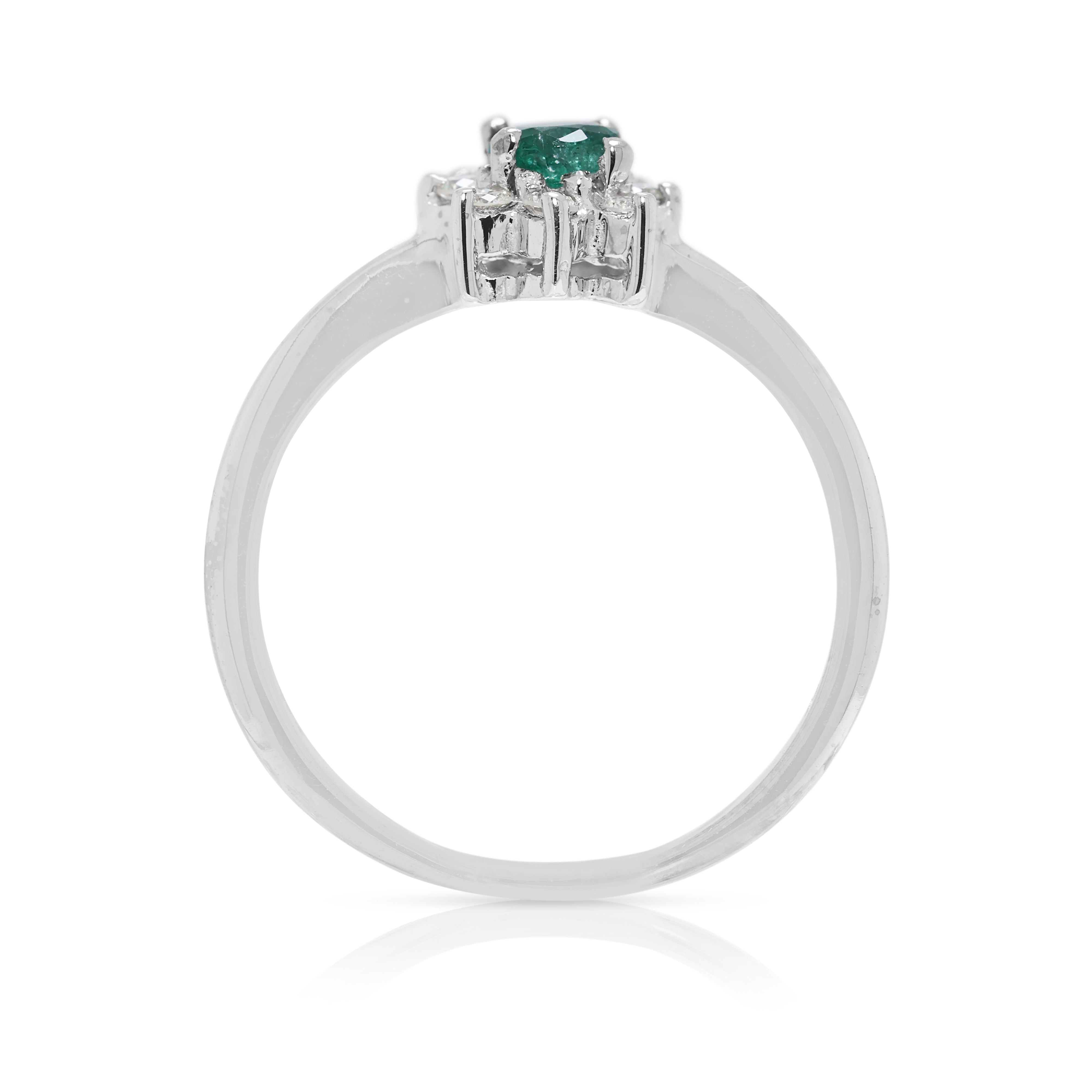 Delicate 0.15ct Emerald & Natural Diamond Halo Ring in 18K White Gold