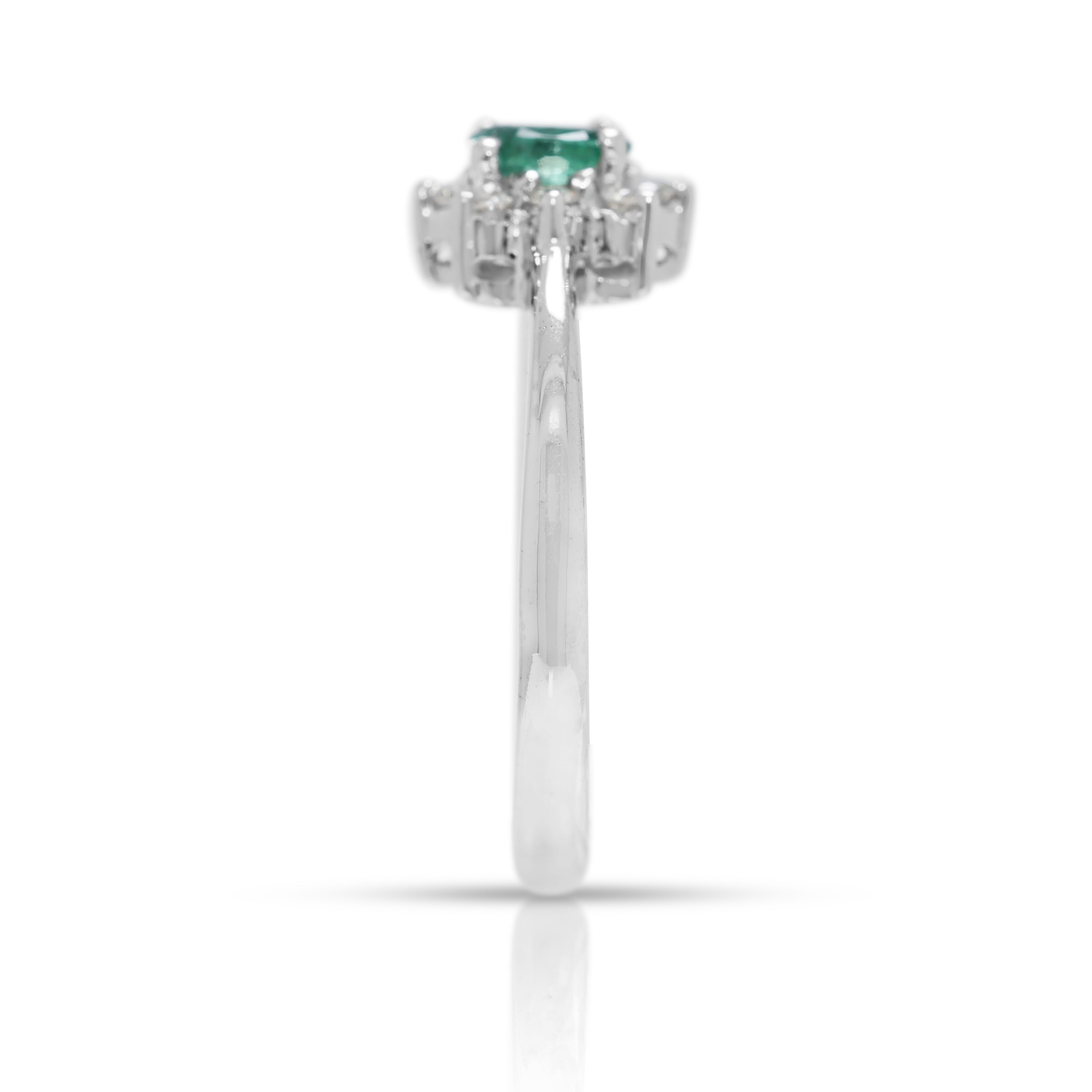 Delicate 0.15ct Emerald & Natural Diamond Halo Ring in 18K White Gold