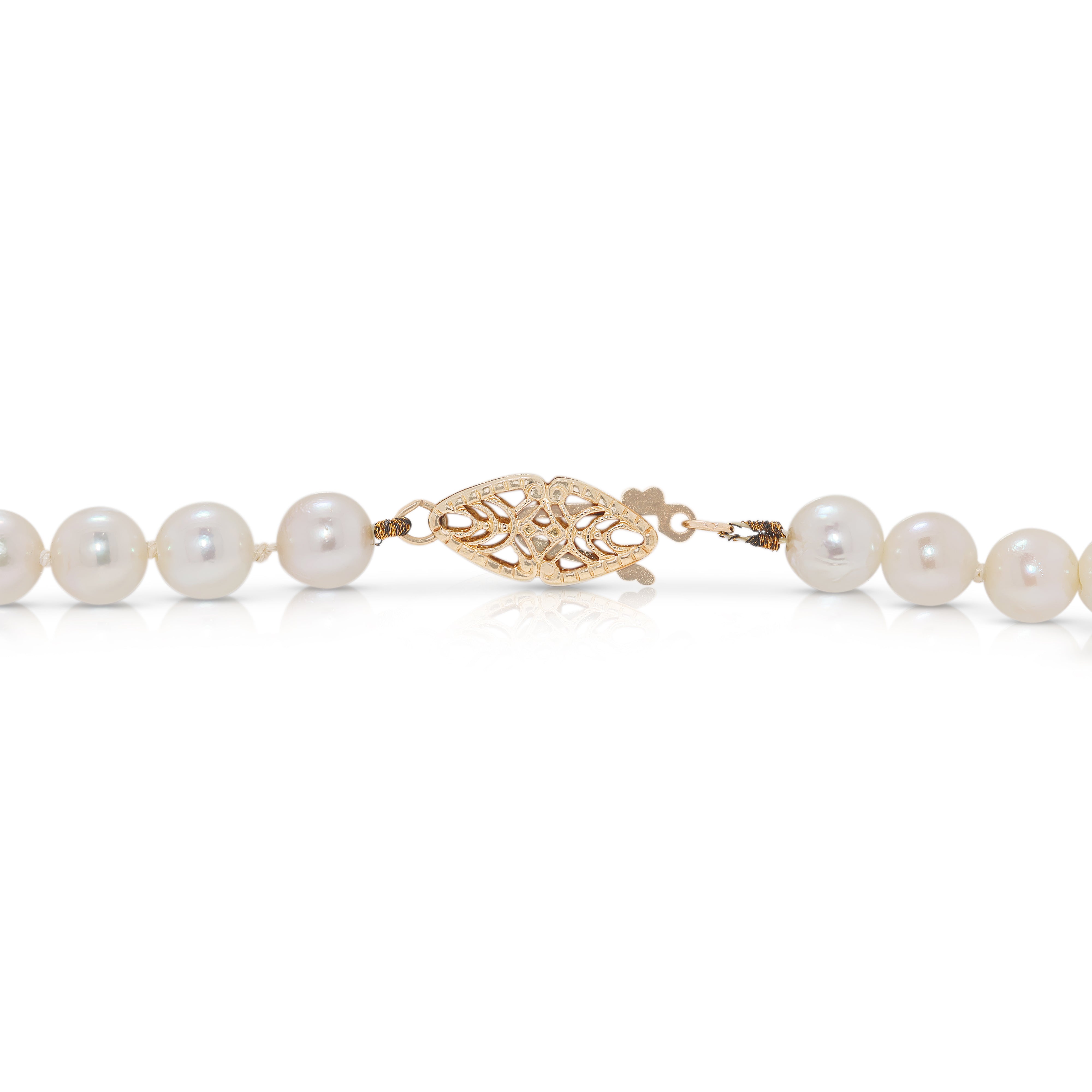 Lustrous 5.5mm Peach Pearl Strand Necklace in 14K Yellow Gold
