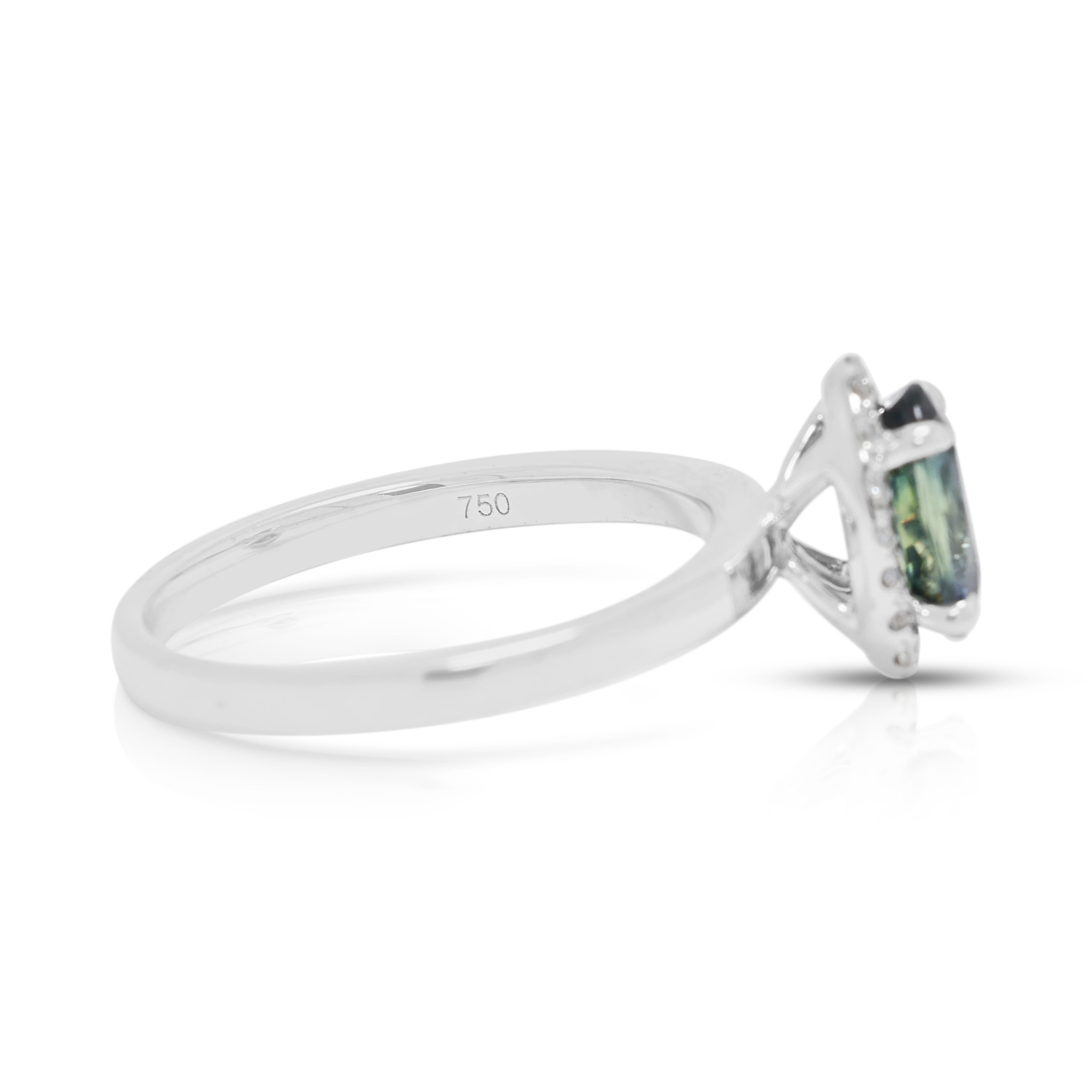 Mesmerizing 1.04ct Greenish Blue Sapphire and 0.09ct Natural Diamond Halo Ring in 18K White Gold - ICL Certified