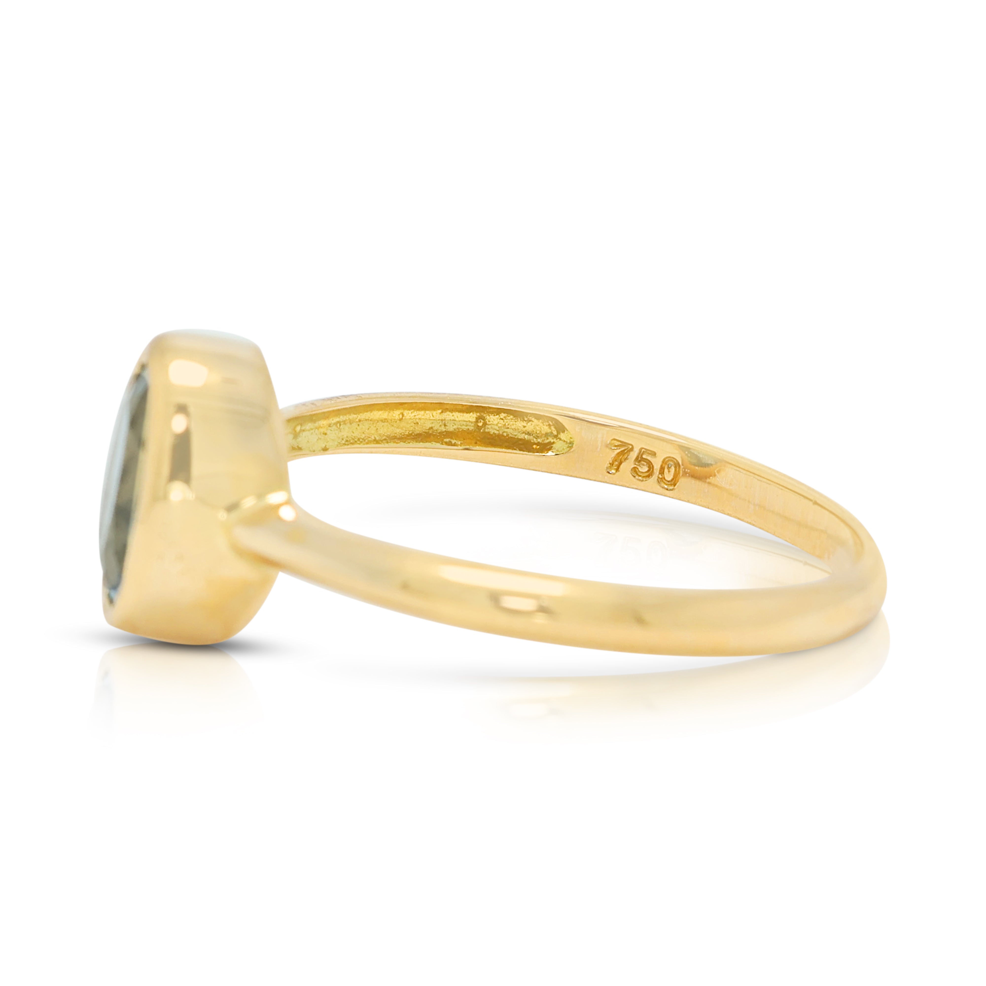 Enchanting 0.70ct Blue Topaz Solitaire Bezel Ring in 18K Yellow Gold