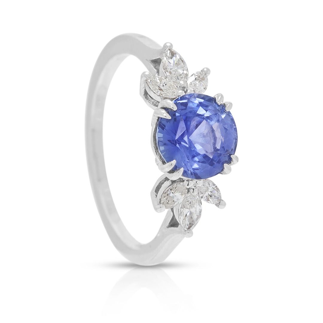 Elegant 1.57ct Blue Sapphire & 0.240ct Diamond Ring in 18K White Gold