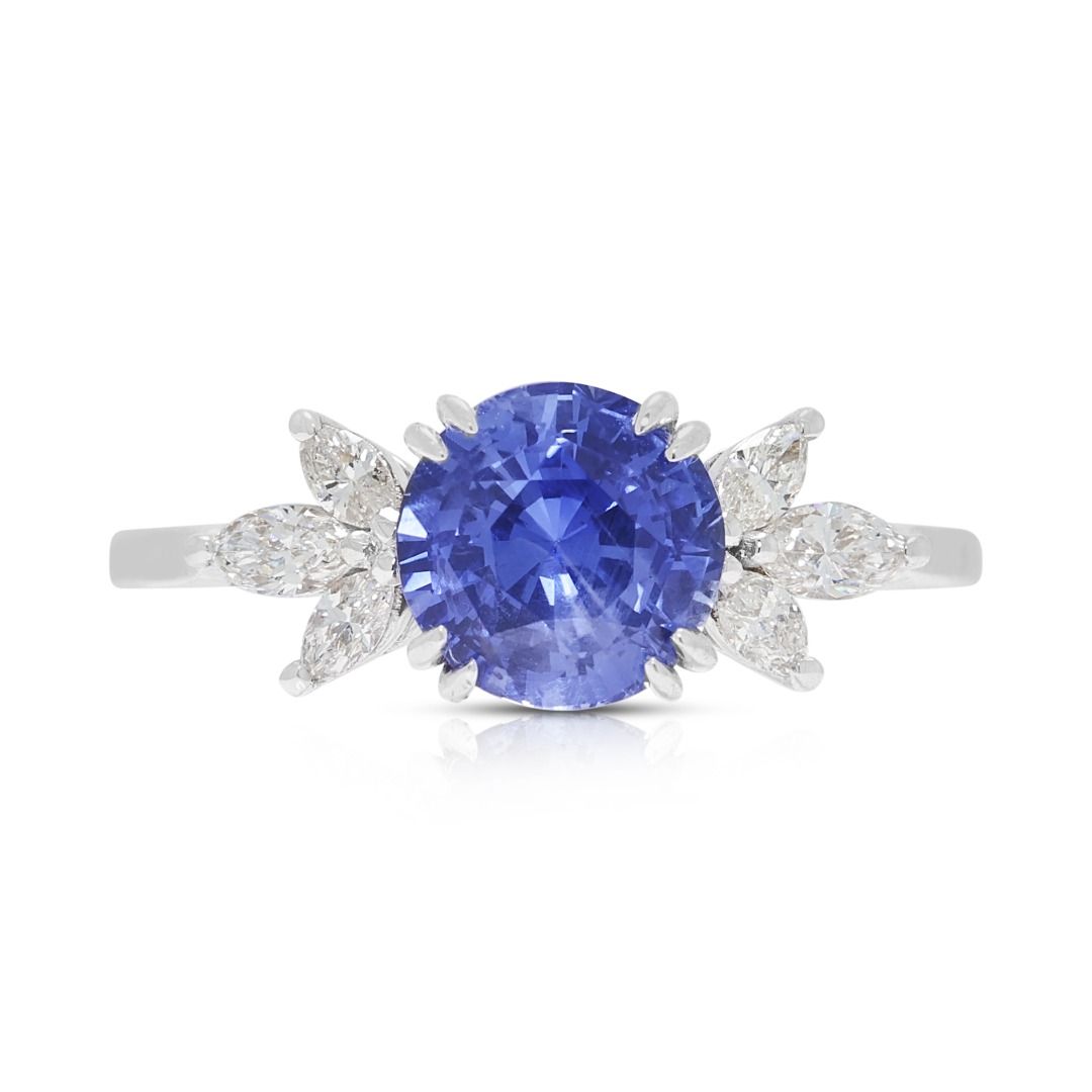 Elegant 1.57ct Blue Sapphire & 0.240ct Diamond Ring in 18K White Gold