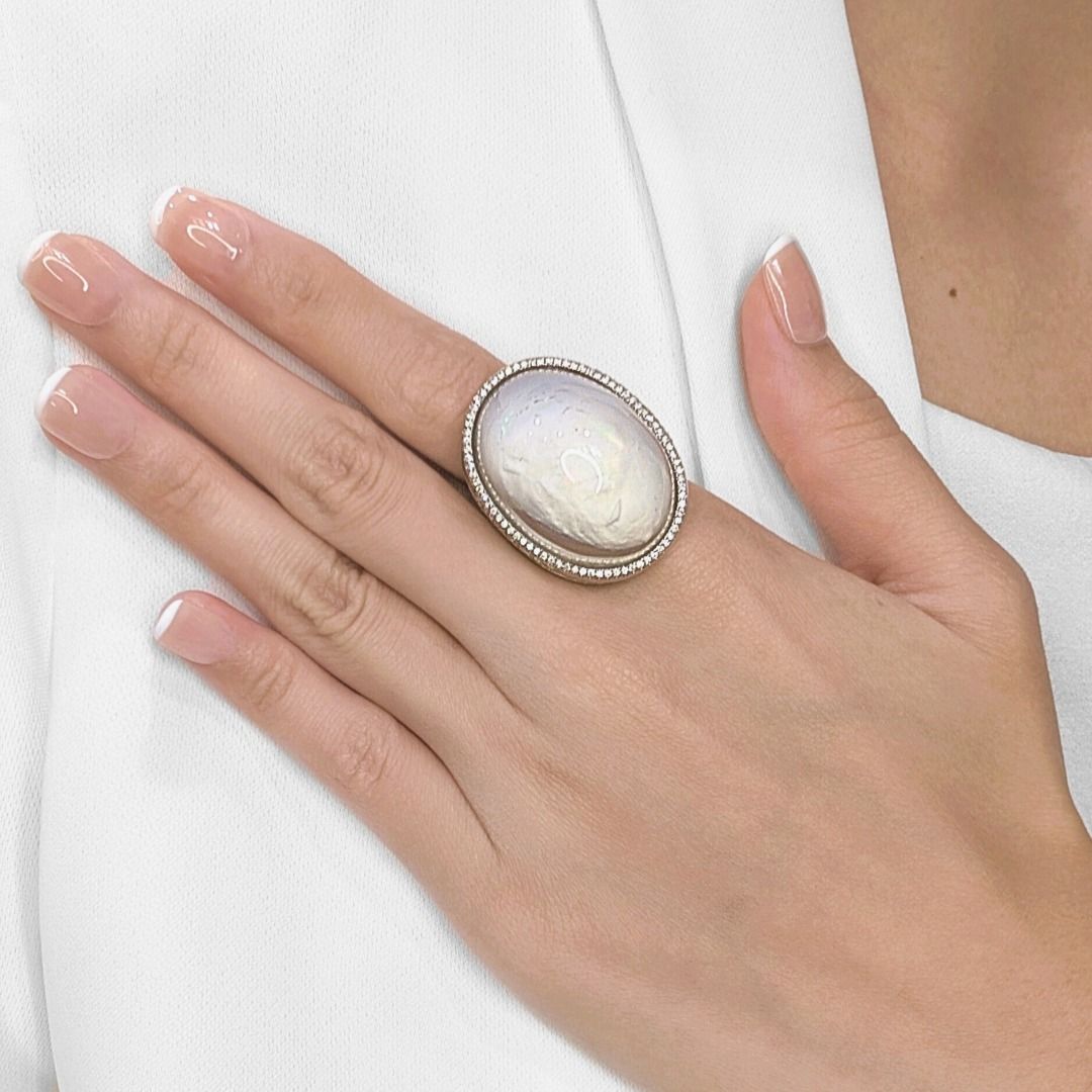 Exquisite Opal Ring with 0.80ct Side Diamonds in 18K White Gold