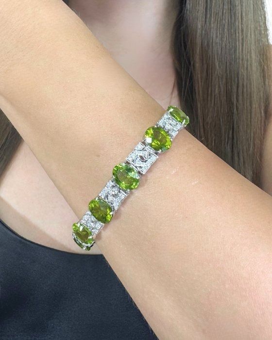Glamorous 27.42ct Peridots and Diamonds Bracelet in 14k White Gold - IGI Certified