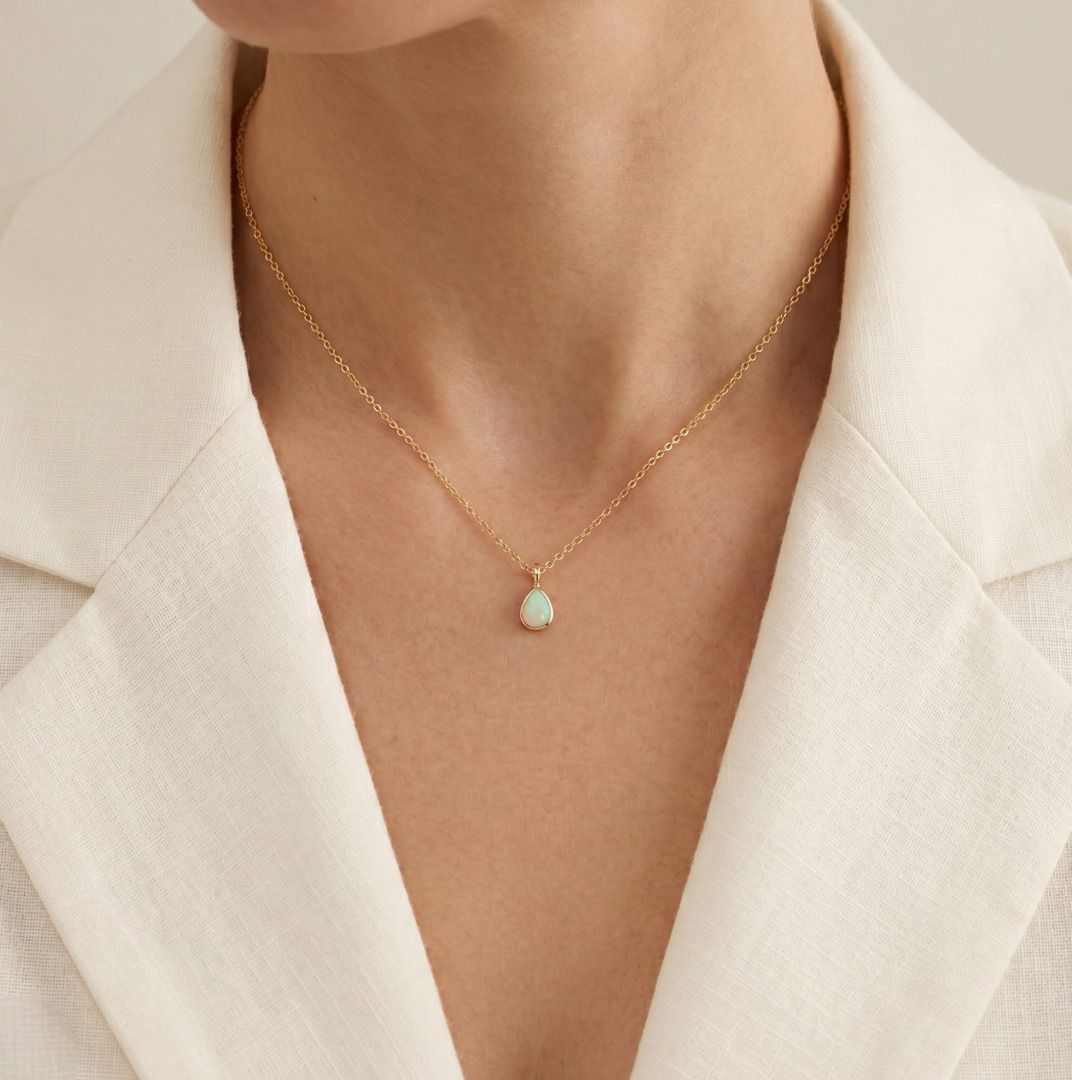 Luminous 0.50ct Opal Pendant Necklace in 14K Yellow Gold