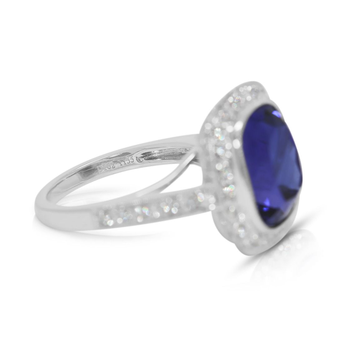 Majestic 12.57ct Tanzanite and Diamond Halo Statement Ring in 18k White Gold - NGI Certified