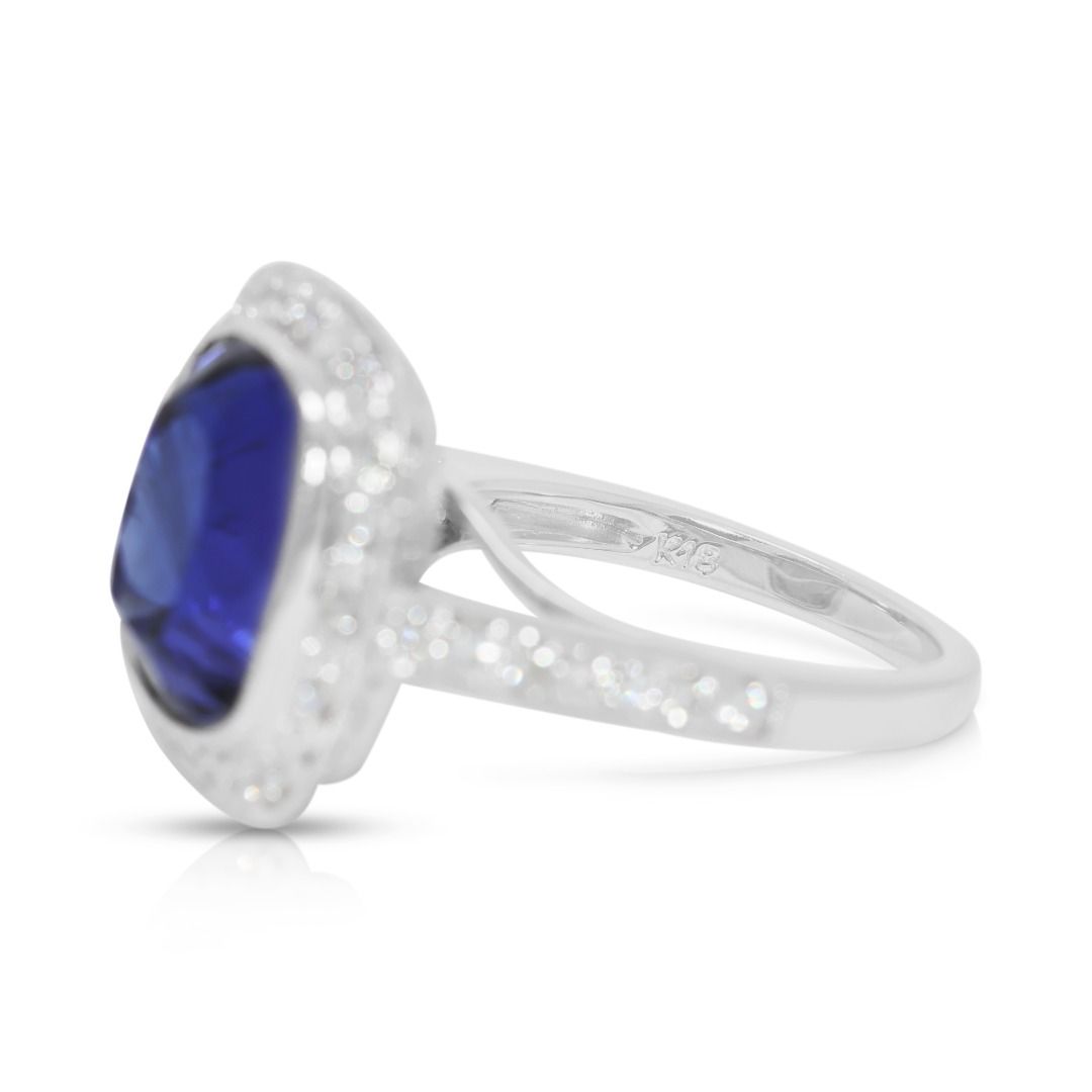 Majestic 12.57ct Tanzanite and Diamond Halo Statement Ring in 18k White Gold - NGI Certified