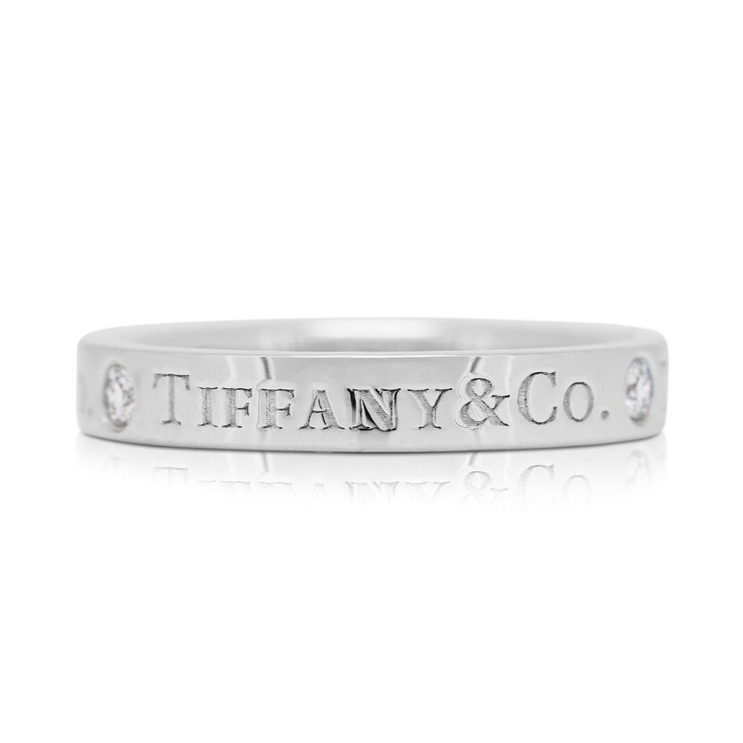 Modest 0.05ct Diamond Platinum Ring by Tiffany & Co.