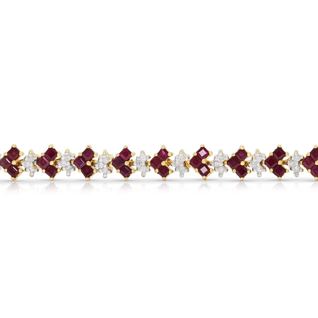 Armband aus 9 Karat Gelbgold mit strahlenden 1,73 Karat Rubinen und 0,69 Karat natürlichen Diamanten