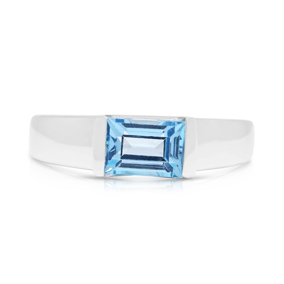 Serene 0.75ct Blue Topaz Baguette Solitaire Ring in 9K White Gold