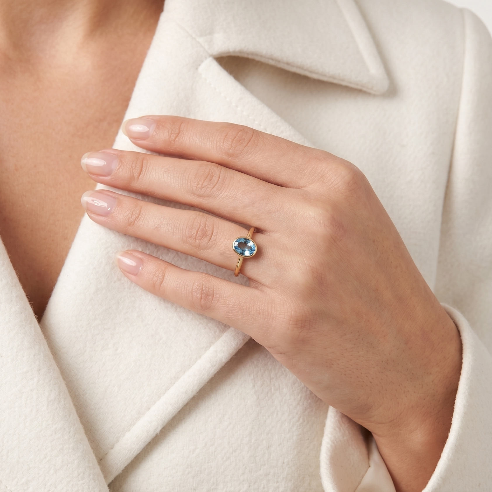 Enchanting 0.70ct Blue Topaz Solitaire Bezel Ring in 18K Yellow Gold
