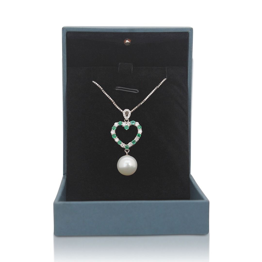 Sophisticated 18K White Gold Pendant with Pearl, Emerald, and Diamond Ensemble