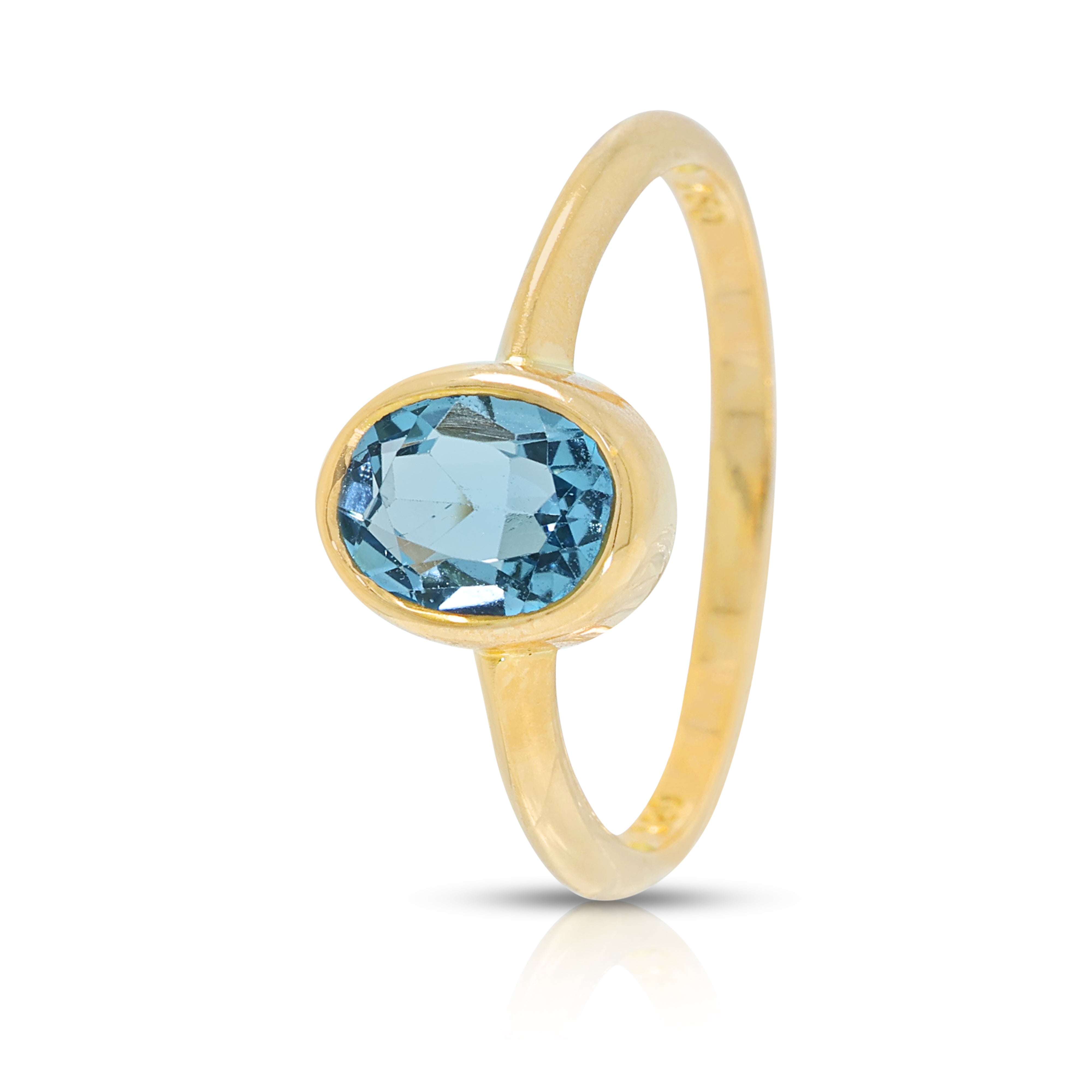 Enchanting 0.70ct Blue Topaz Solitaire Bezel Ring in 18K Yellow Gold