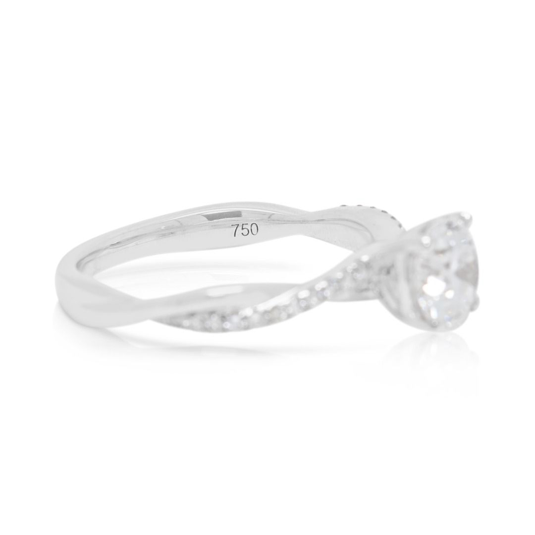 Brillanter 0,9-Karat-Labor-Diamant mit 0,10-Karat-Naturdiamant-Twist-Bandring in 18K Weißgold – IGI-zertifiziert
