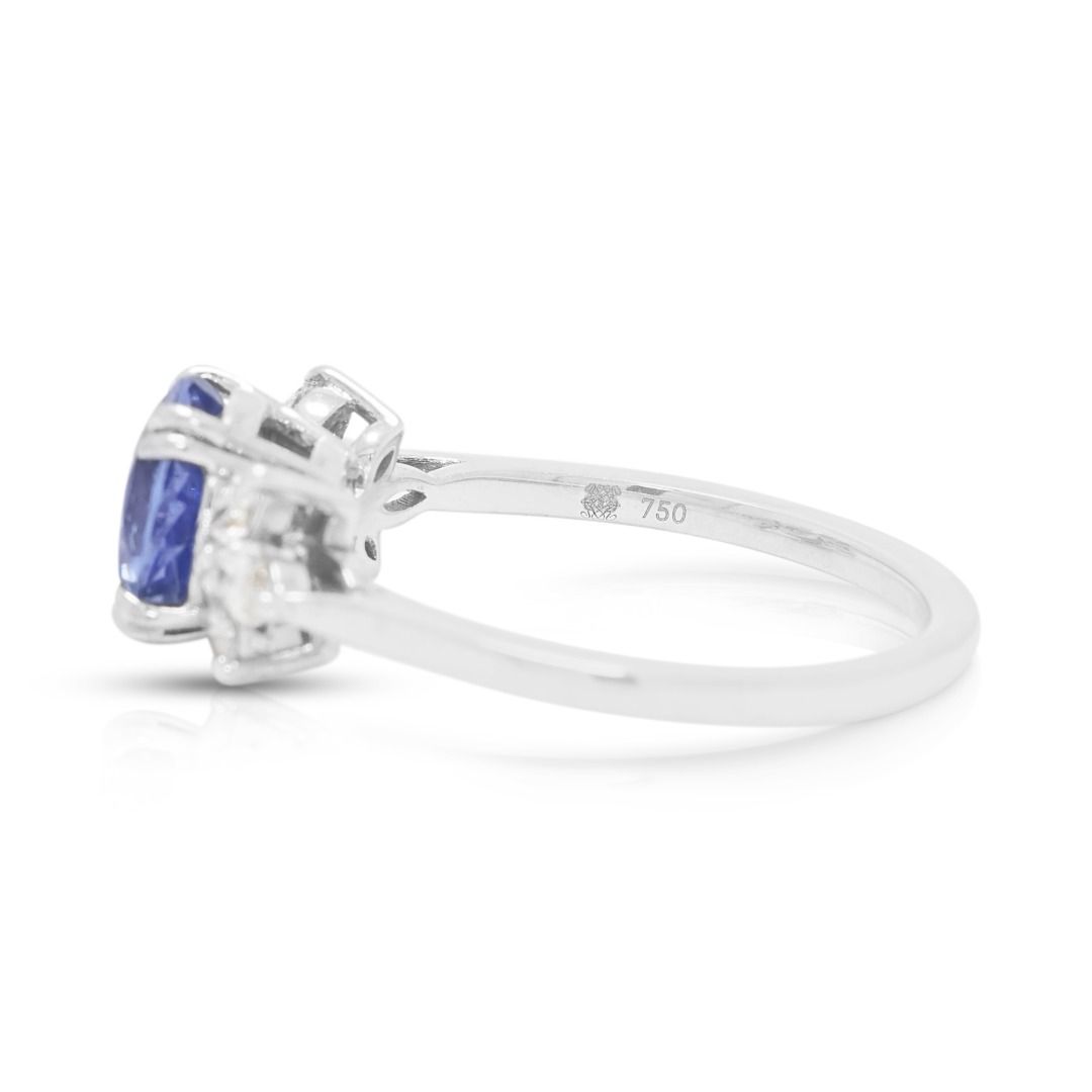 Elegant 1.57ct Blue Sapphire & 0.240ct Diamond Ring in 18K White Gold