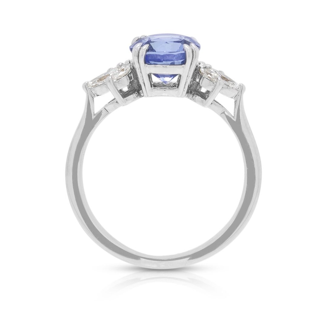 Elegant 1.57ct Blue Sapphire & 0.240ct Diamond Ring in 18K White Gold