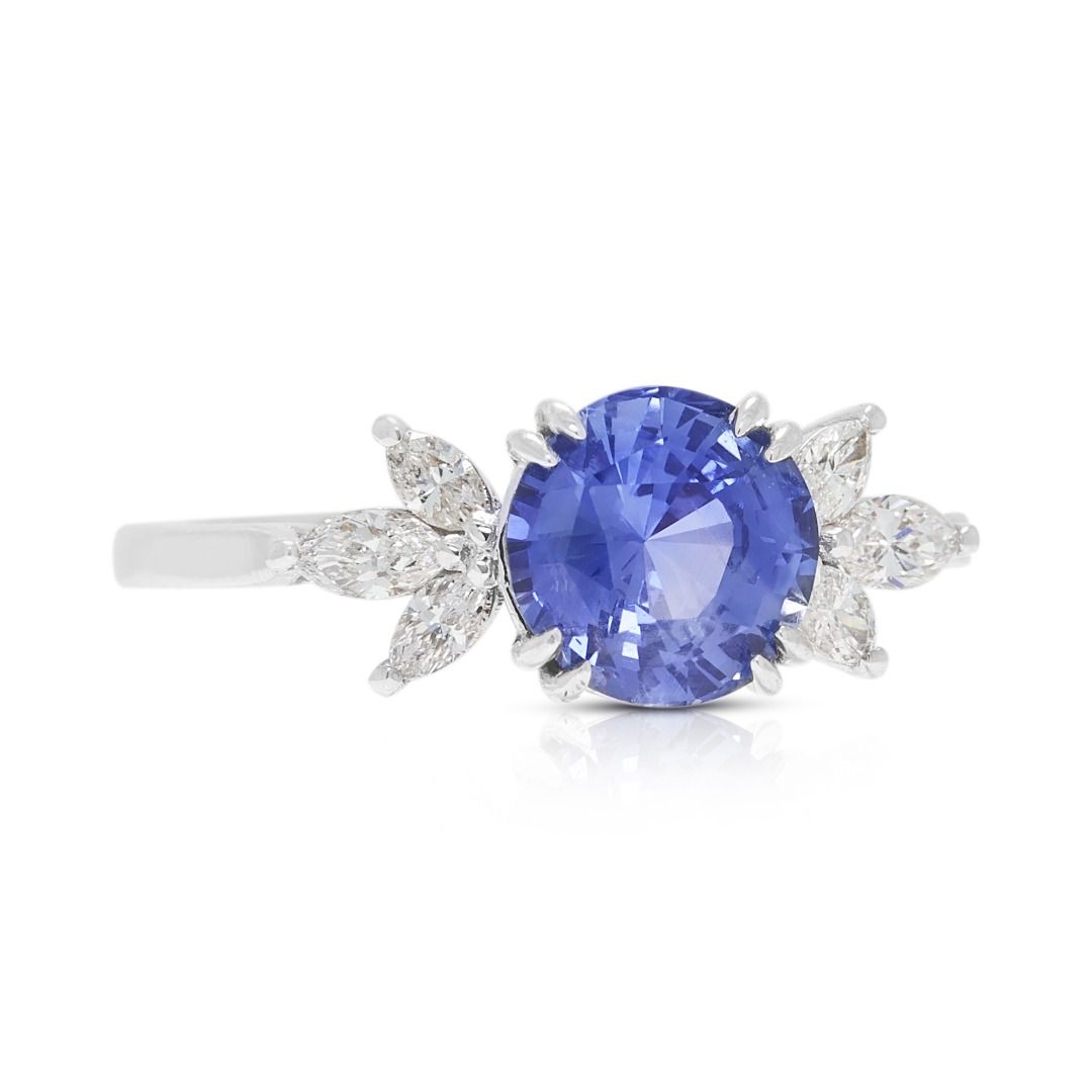 Elegant 1.57ct Blue Sapphire & 0.240ct Diamond Ring in 18K White Gold