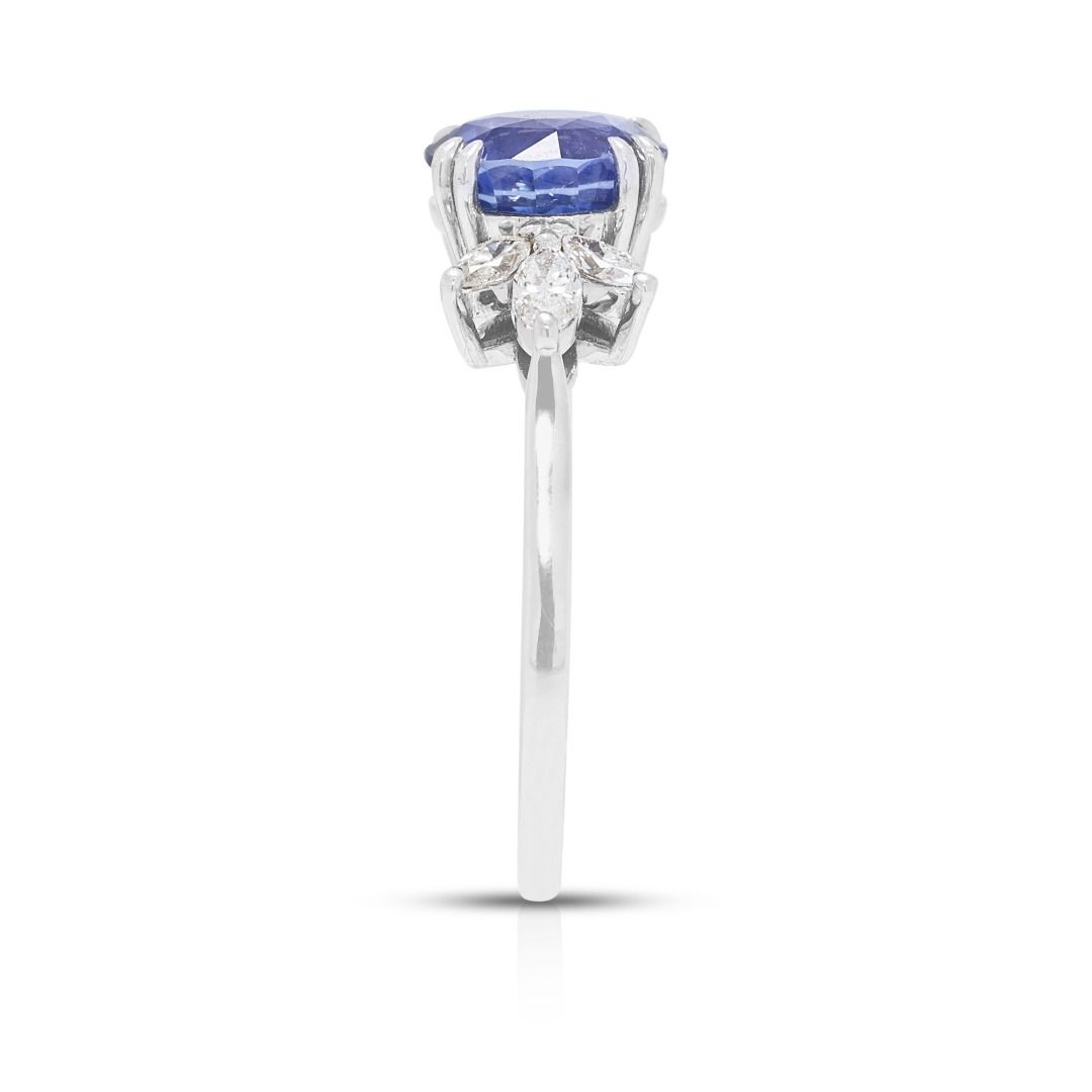 Elegant 1.57ct Blue Sapphire & 0.240ct Diamond Ring in 18K White Gold