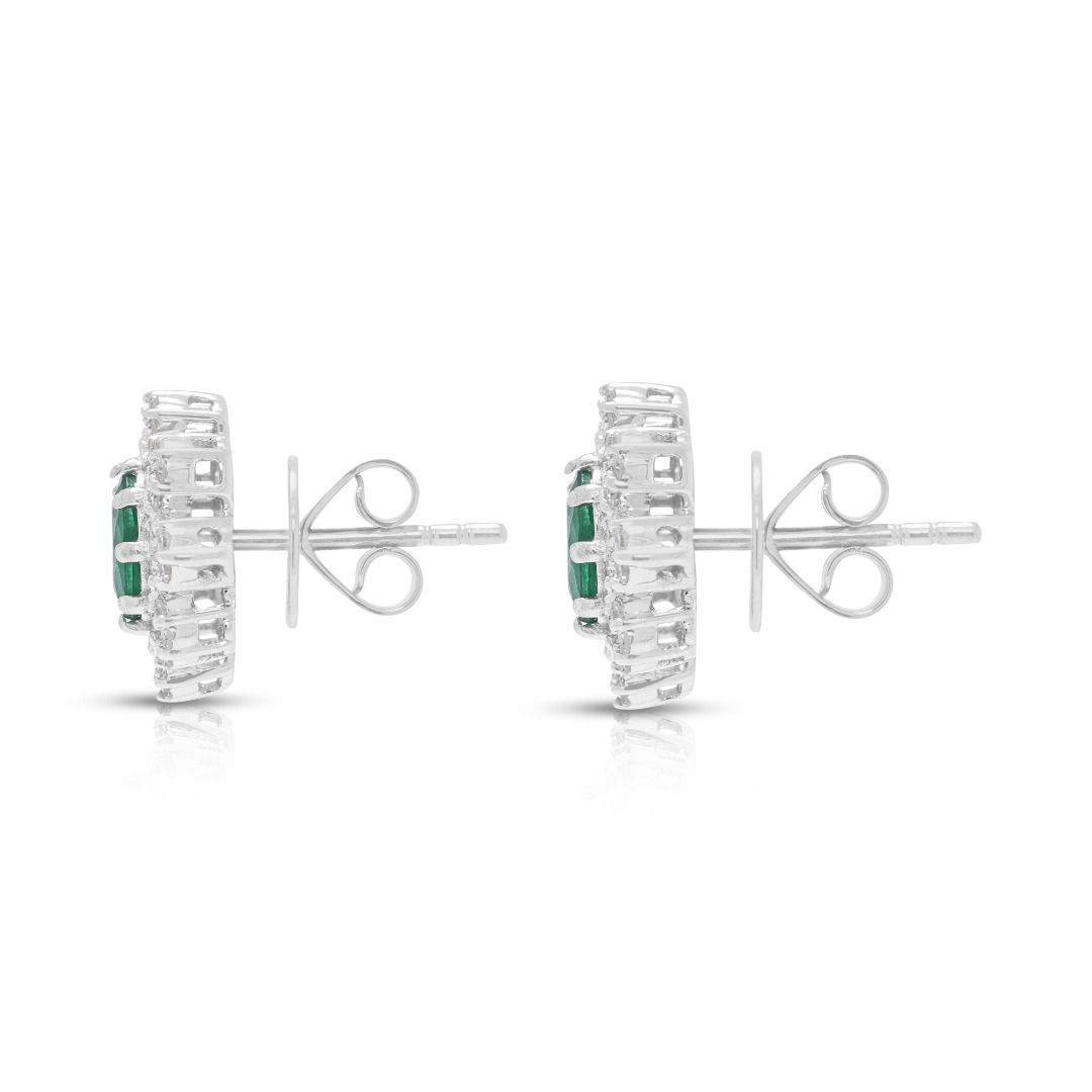 Exquisite 0.60ct Emerald and 0.56ct Natural Diamonds Floral Halo Stud Earrings in 18K White Gold with GCI Certificate