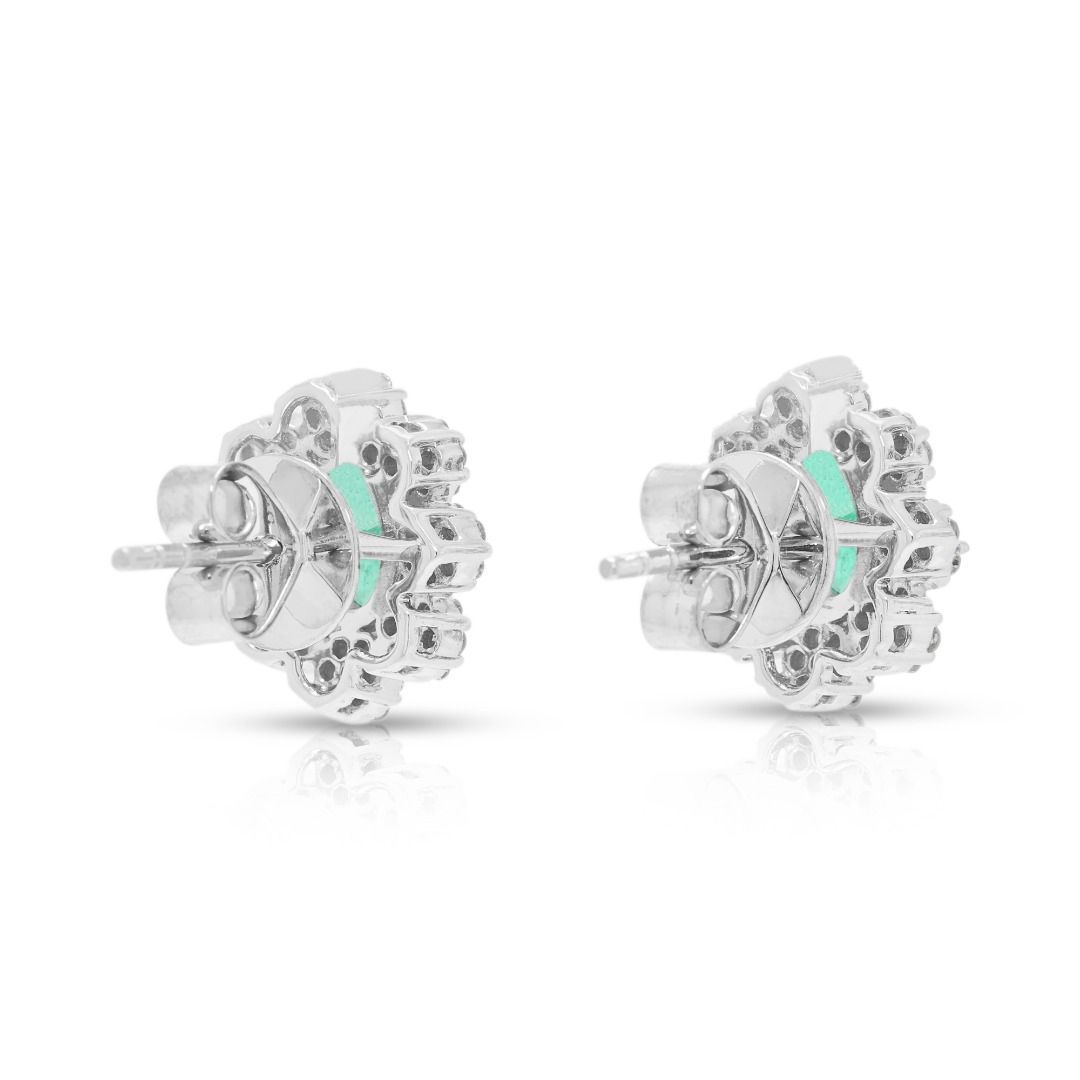 Exquisite 0.60ct Emerald and 0.56ct Natural Diamonds Floral Halo Stud Earrings in 18K White Gold with GCI Certificate