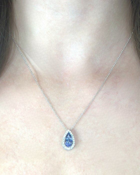 Exquisite 1.74ct Tanzanite and Diamonds Necklace with Halo Pendant in 18k White Gold - IGI Certified