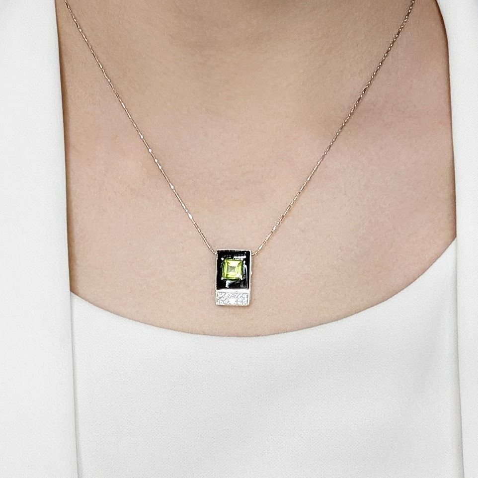 Lustrous 1.35ct Peridot and Diamond Pendant with Onyx in 18K White Gold