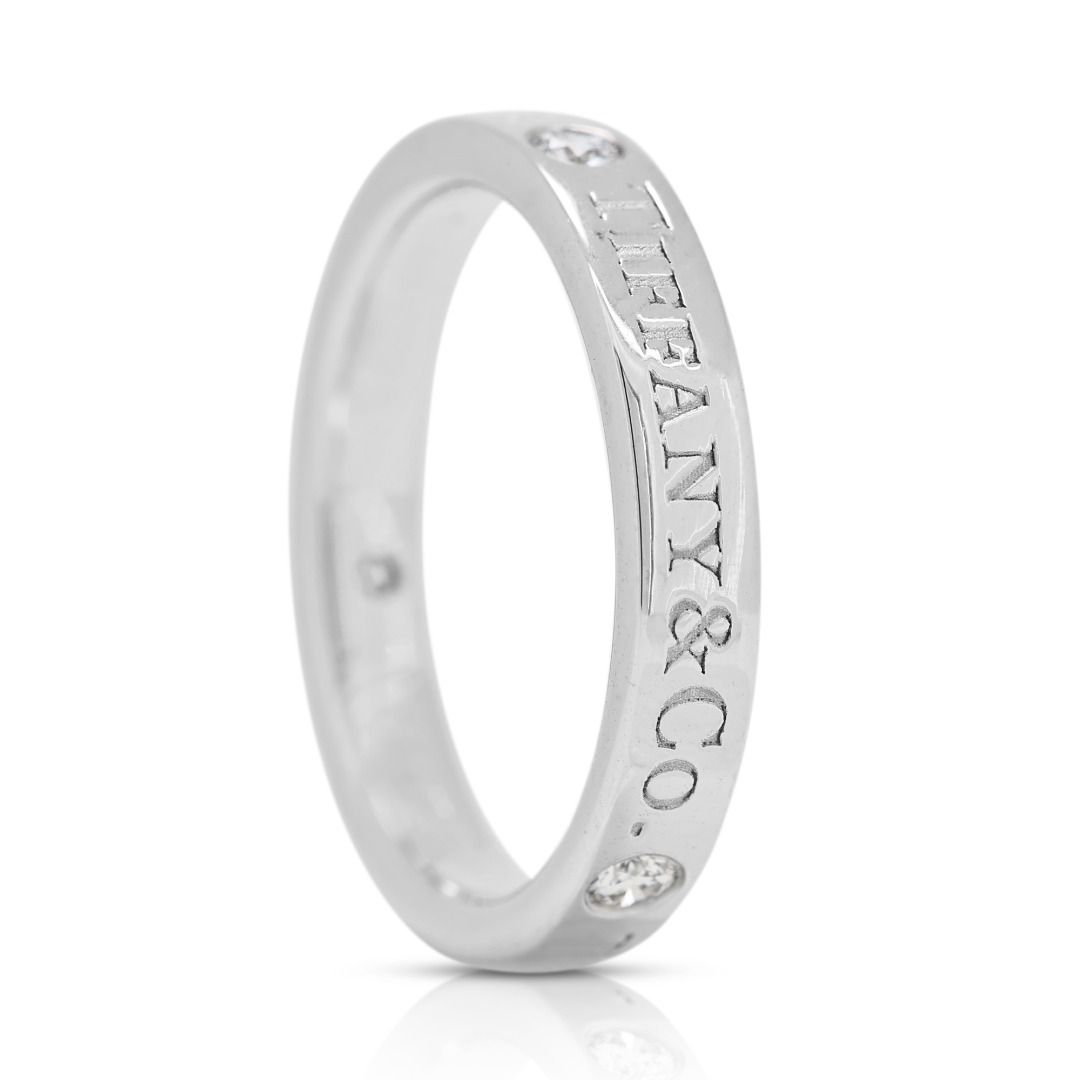 Modest 0.05ct Diamond Platinum Ring by Tiffany & Co.