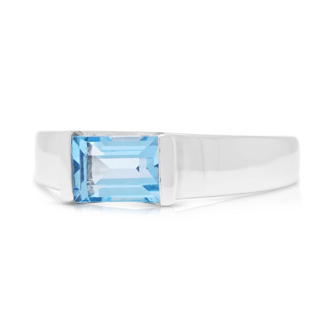 Serene 0.75ct Blue Topaz Baguette Solitaire Ring in 9K White Gold