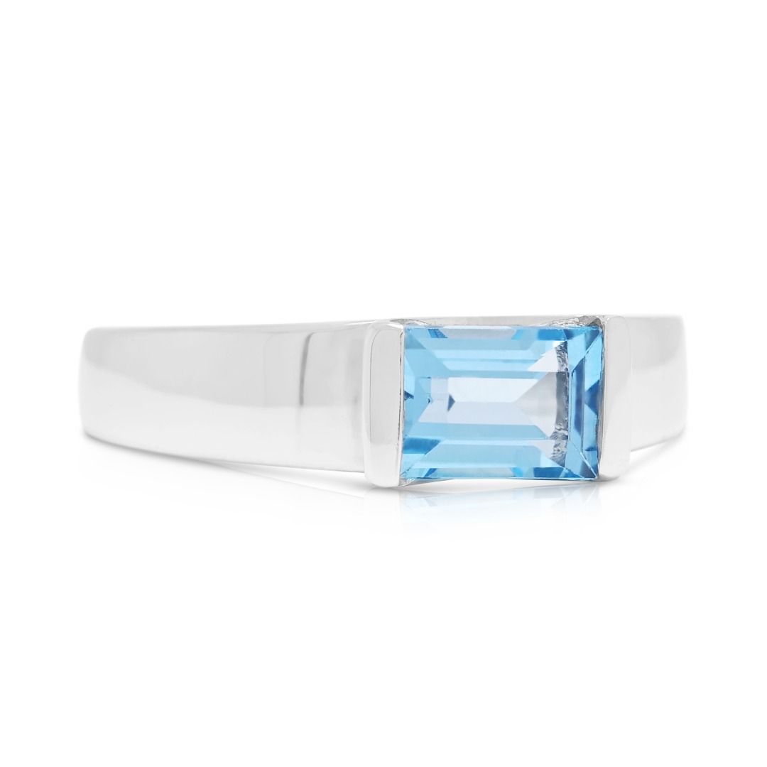 Serene 0.75ct Blue Topaz Baguette Solitaire Ring in 9K White Gold