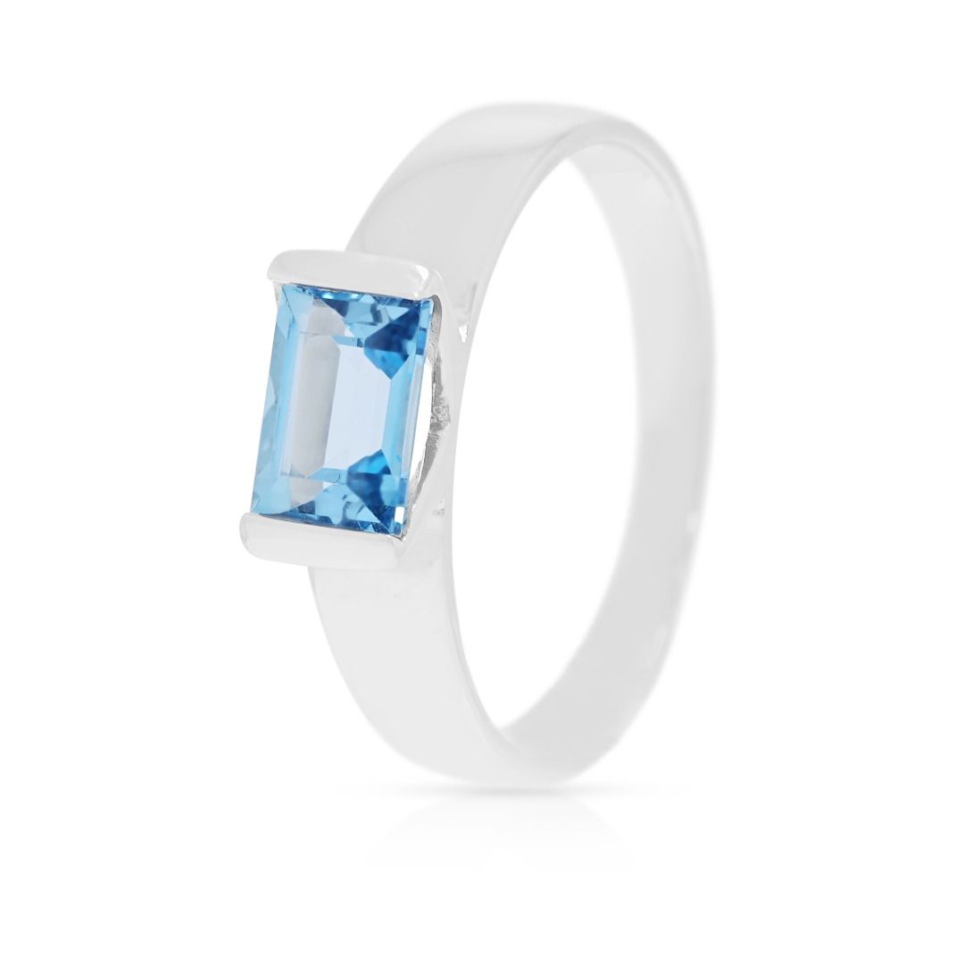 Serene 0.75ct Blue Topaz Baguette Solitaire Ring in 9K White Gold