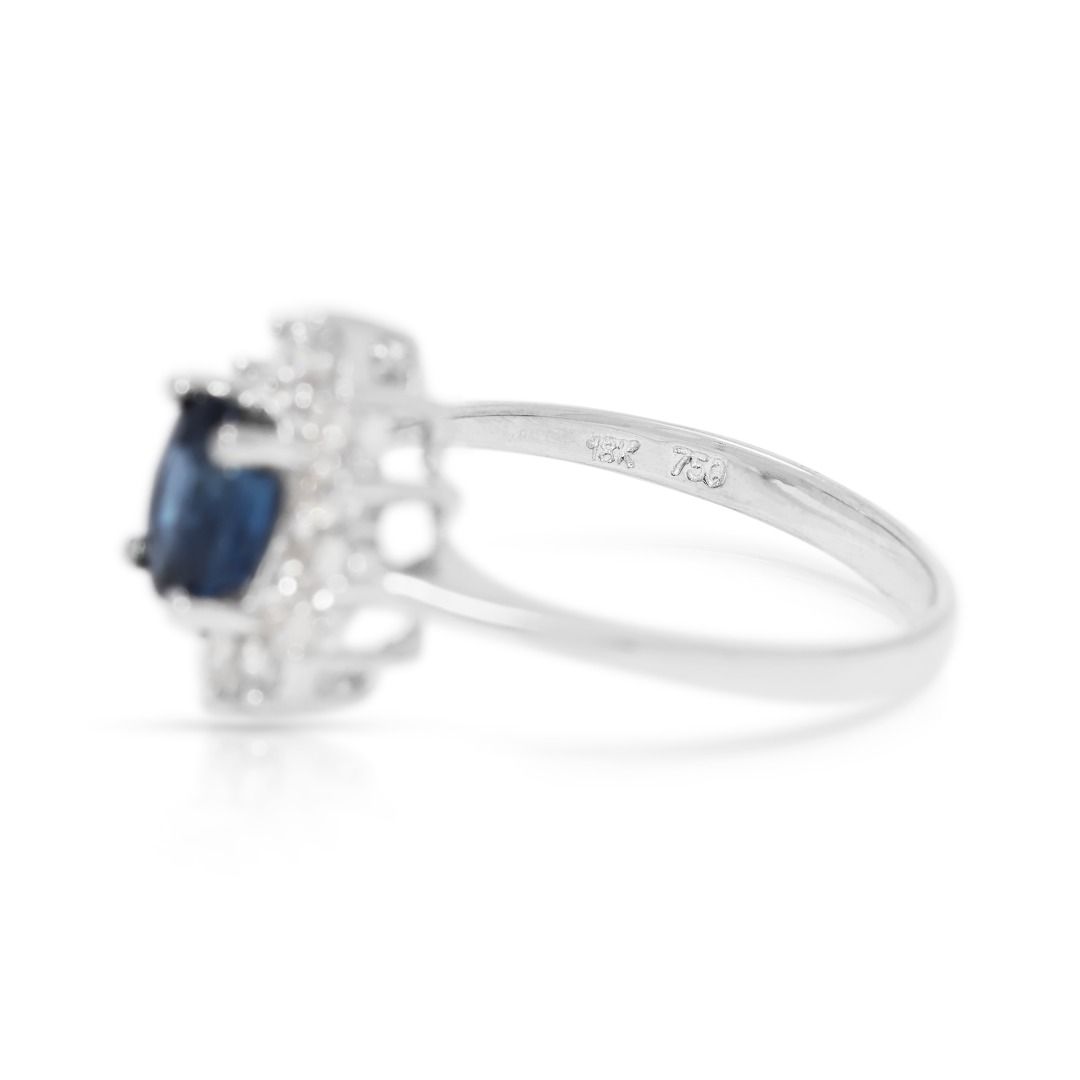 Sophisticated 0.92ct Sapphire and Diamond Halo Ring in 18k White Gold