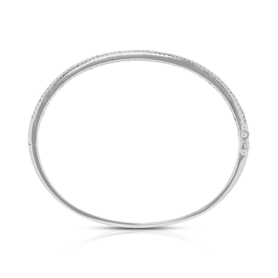 Sophisticated 1.32ct Blue Sapphire and Diamond Infinity Bangle in 18k White Gold